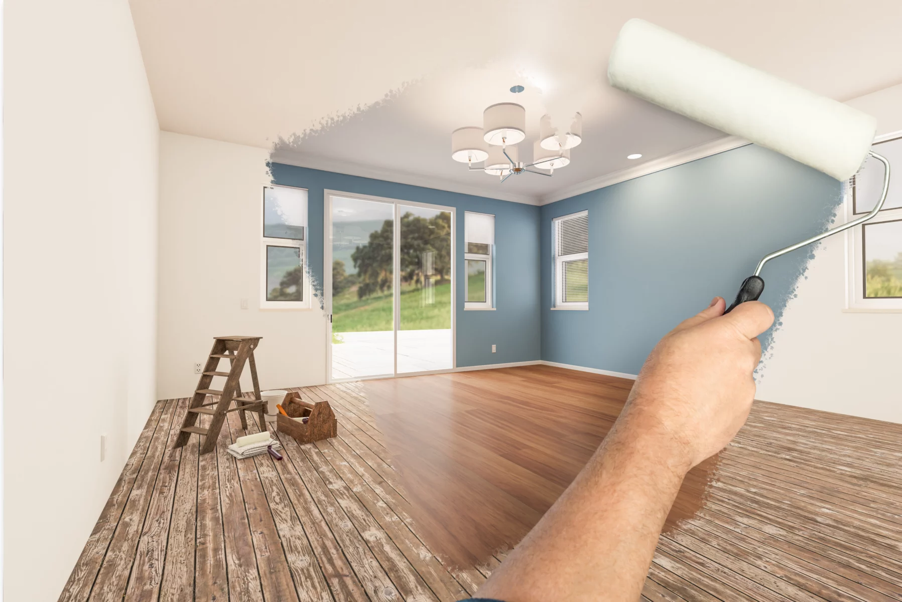 A paint roller reveals a dramatic room transformation from dull and unfinished to modern, bright, and inviting.
