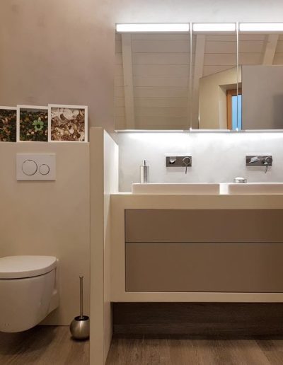 Modern minimalist bathroom with microcement finish